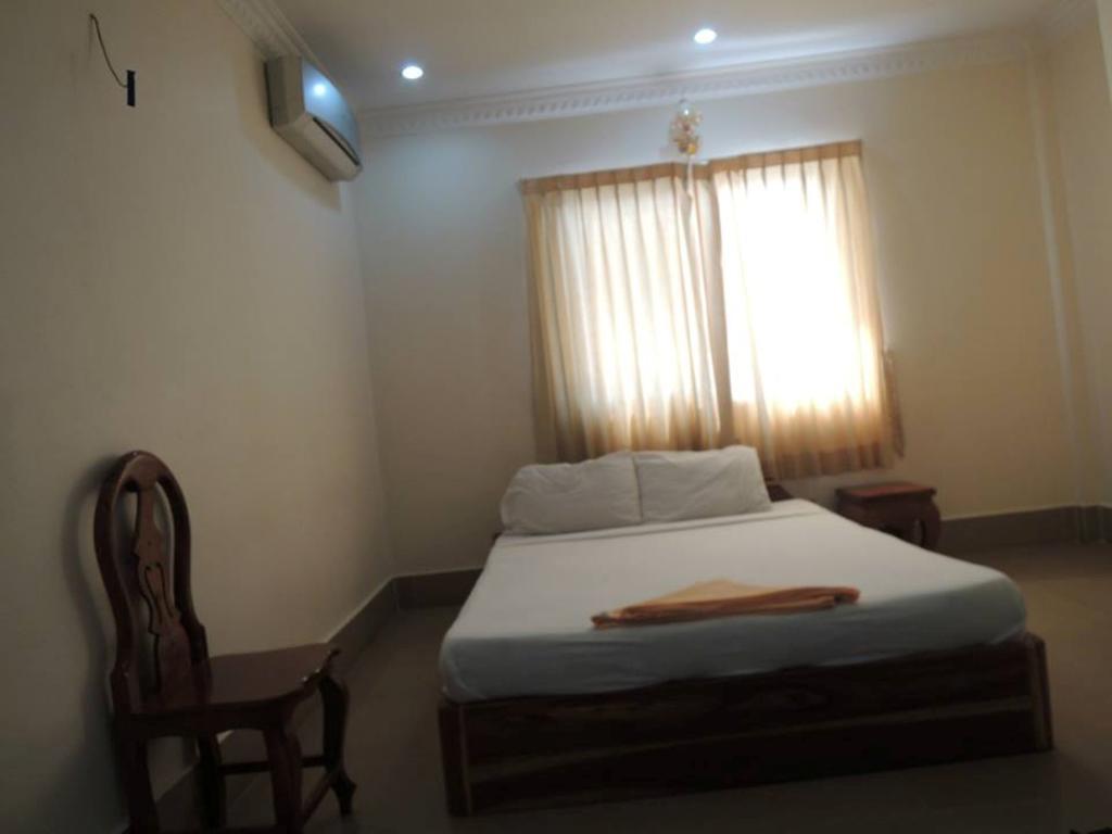 Shang Hai Guesthouse Battambang Rum bild